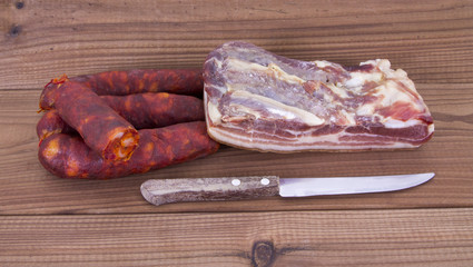 sausages and bacon on the table