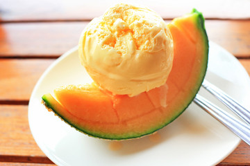 Vanilla Icecream with melon piece a summer dessert