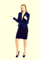 Businesswoman inviting to an office