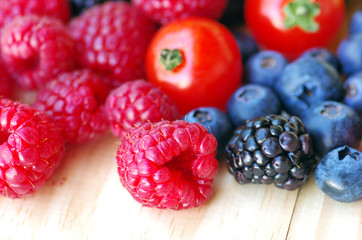 wild fruits, cherry tomatoes, blackberrys and  raspberrys