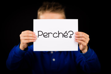 Child holding sign with Italian word Perche - Why