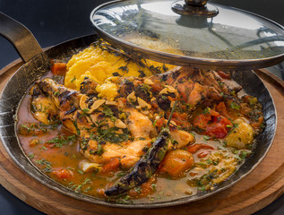 romanian traditional chicken dish in pan
