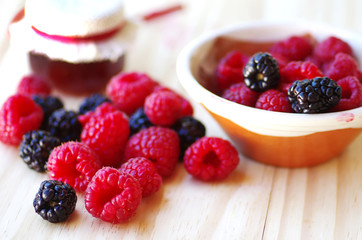  blackberry and raspberry on table