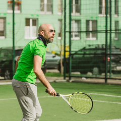 man play tennis outdoor