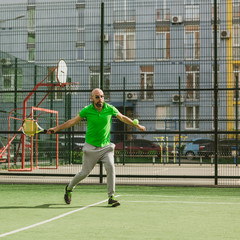 man play tennis outdoor