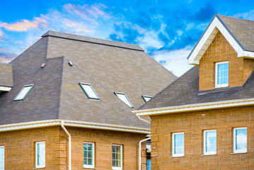 house with a gable roof window