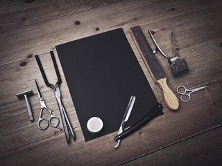 Vintage barber tools and black paper