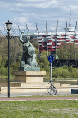 National Stadium and Statue of Mermaid in Warsaw, Poland © Cinematographer