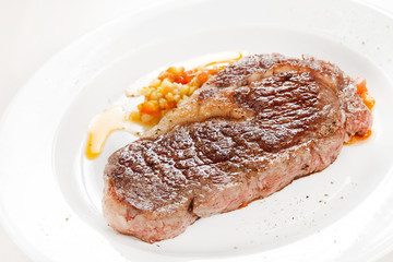 Grilled steak with vegetables