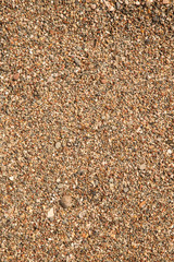 Different stones pebble beach. Toned