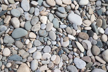 Different stones pebble beach. Selective focus