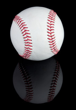 Baseball on black reflective background. Clipping path included