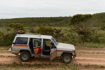 The cars of tourists Surrounding the river Guayabero