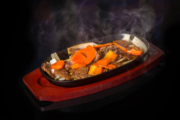 Meat with carrots and onions