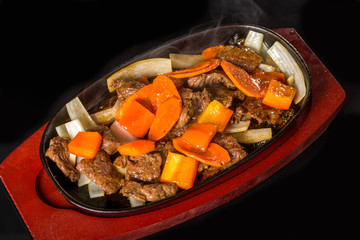 Meat with carrots and onions