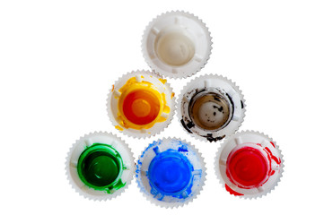 cap of tubes of acrylic paint isolated