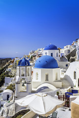 Santorini blue dome churches in Greece