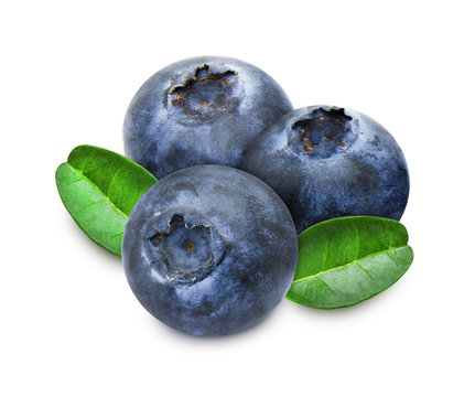 Heap of blueberries with leaves isolated on white background
