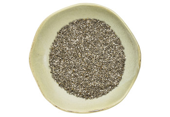 Obraz na płótnie Canvas chia seeds in ceramic bowl