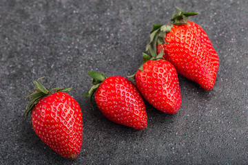 Strawberries on black background