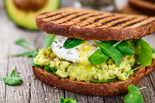 Sandwich With Avocado And Poached Egg