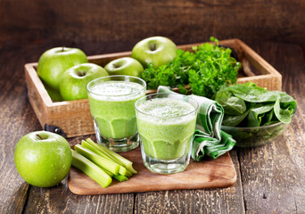 glasses of green juice with apple, celery and spinach