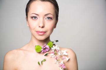 Woman with flowers on her showlder