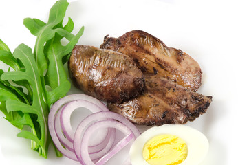 Roasted chiken liver with vegetables isolated on white