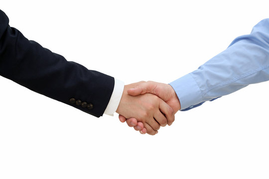 Close-up Image Of A Firm Handshake  Between Two Colleagues On A