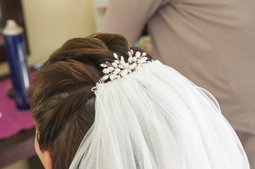 Back of brides head showing hair piece