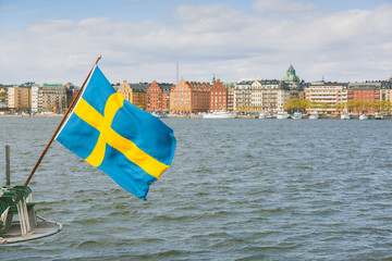 Swedish flag on the rear of a boat in Stockholm