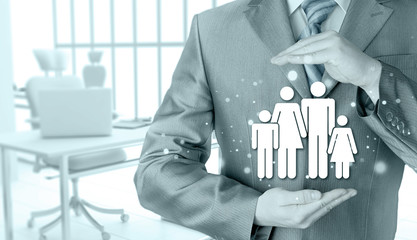 businessman protecting family Insurance concept