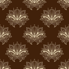 Brown and yellow eamless pattern with paisley ornament