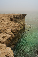 Rocky steep cliff of Cyprus coast