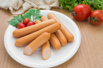 Heap of sausages on plate