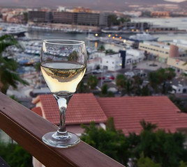 Evening view with glass of white wine