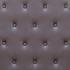 Pattern of brown leather seat upholstery