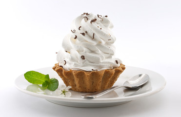 Birthday cupcake with mint on plate, on white background