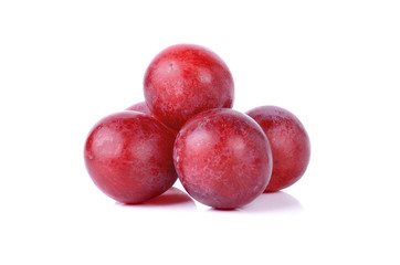 Fototapeta na wymiar Red grapes isolated on a white background
