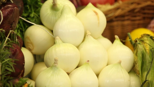 Vegetables in market. Slide. Green Onion. garlic