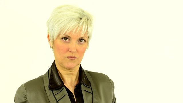 business middle aged woman points to watch