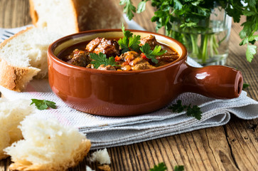 Meat stew in ceramic pot