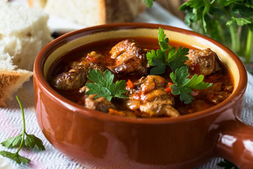 Meat stew in ceramic pot