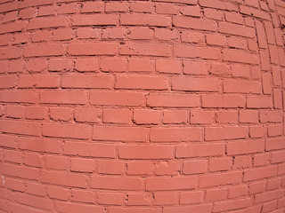 A fragment of a brick wall painted