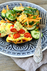 Tasty fritatta with carrots and cucumbers