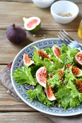 Delicious salad with figs and lettuce