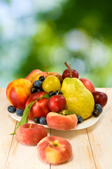 Naklejka na ściany i meble different fruits on a plate