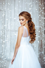 Portrait of Beautiful Bride in Lights. Fashion Dress and MakeUp