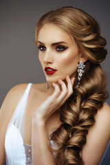 Portrait of Beautiful Woman. Long Hair and Fashion MakeUp