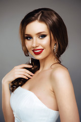 Portrait of Beautiful Woman with Long Hair and Fashion MakeUp